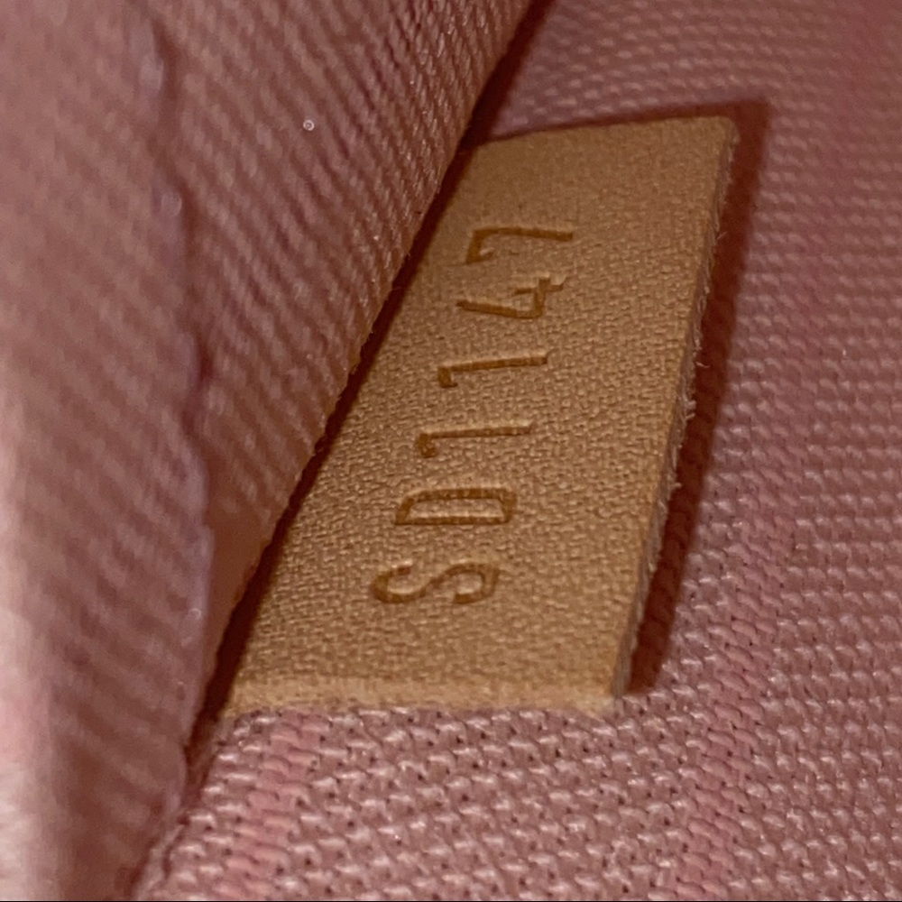 Louis Vuitton Never full mm wristlet pouch pink interior